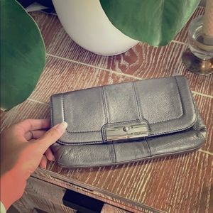 Silver leather coach clutch purse